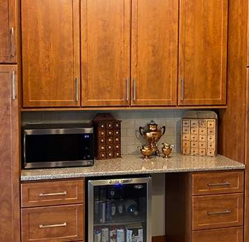 gal- kitchen with brown wooden cabinets
