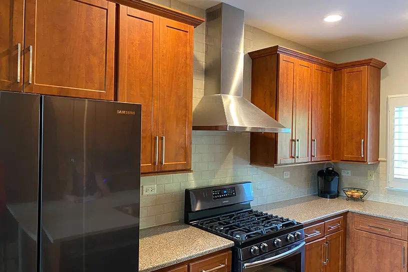 Fisher residence after resurfacing in red brown wood