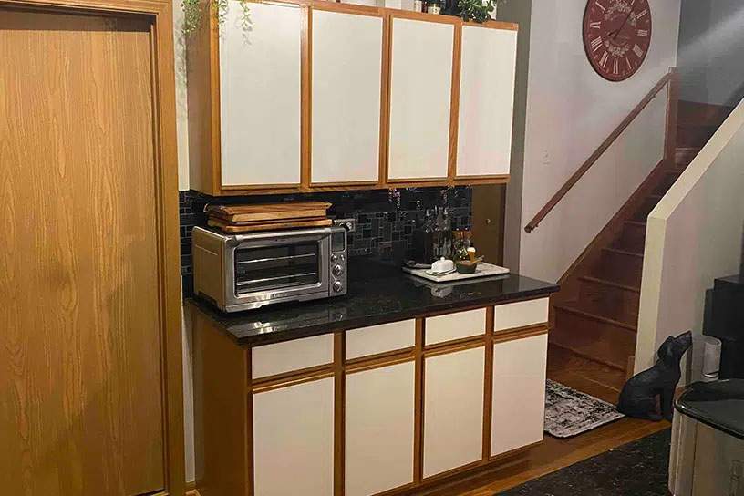 after cabinet resurfacing in modern brown and white wood