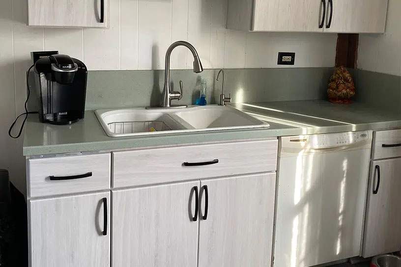 after cabinet resurfacing with moden white wood