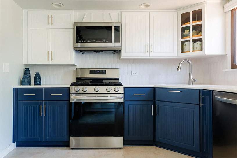 cabinet refacing after with blue cabinets